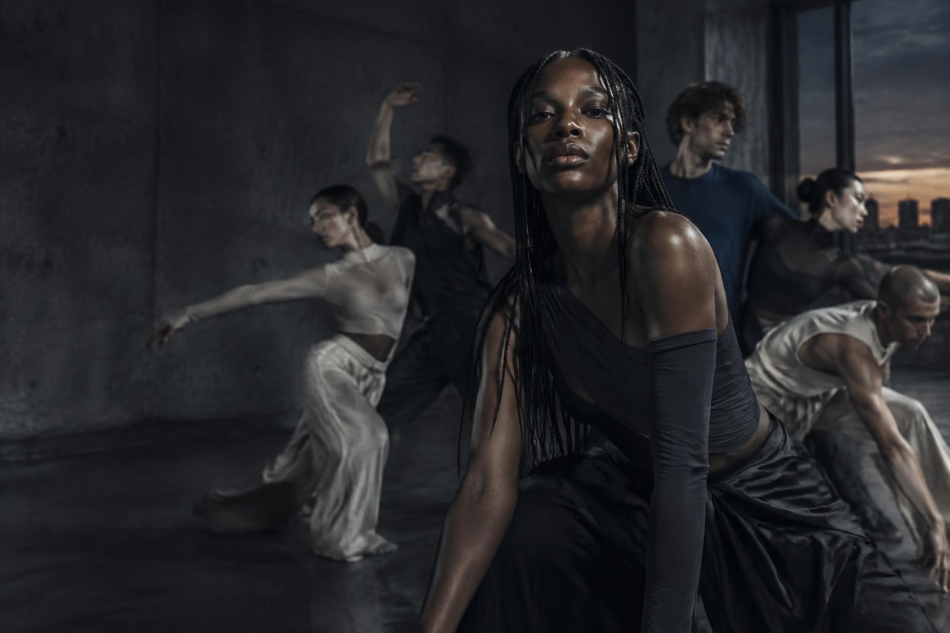 A contemporary dance ensemble in rehearsal
